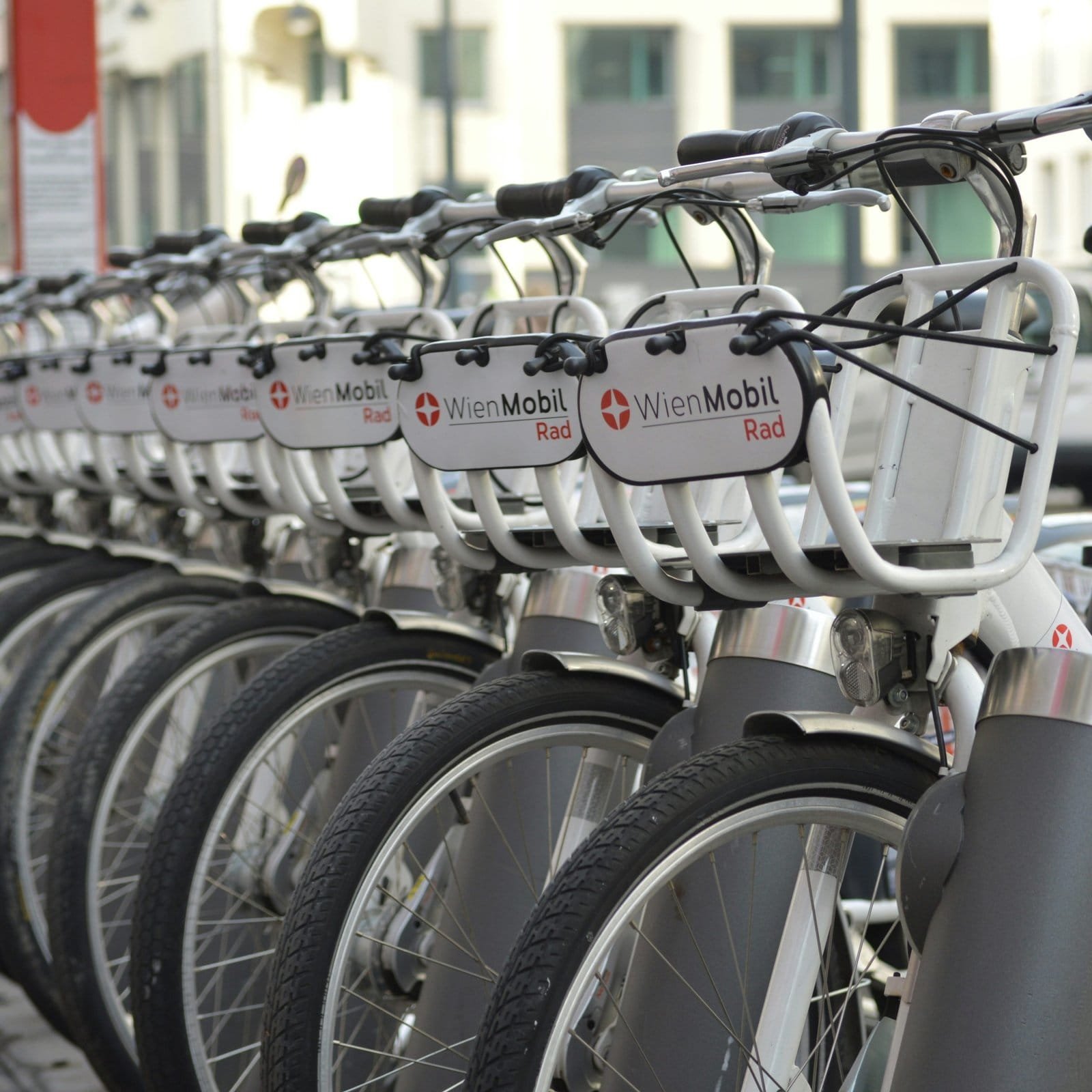 A row of bicycles parked next to each other